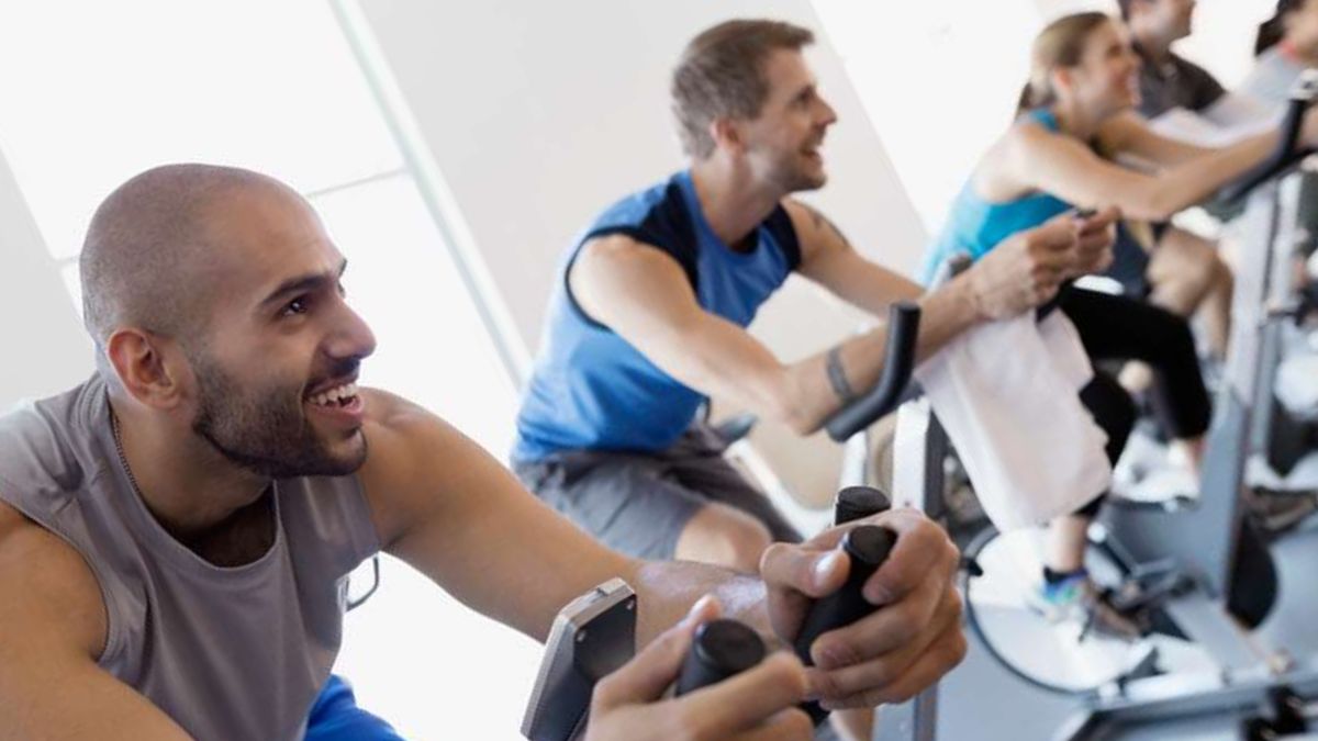 What are the Main Differences Between a Spin Bike and a Stationary Bike for At-Home Workouts?